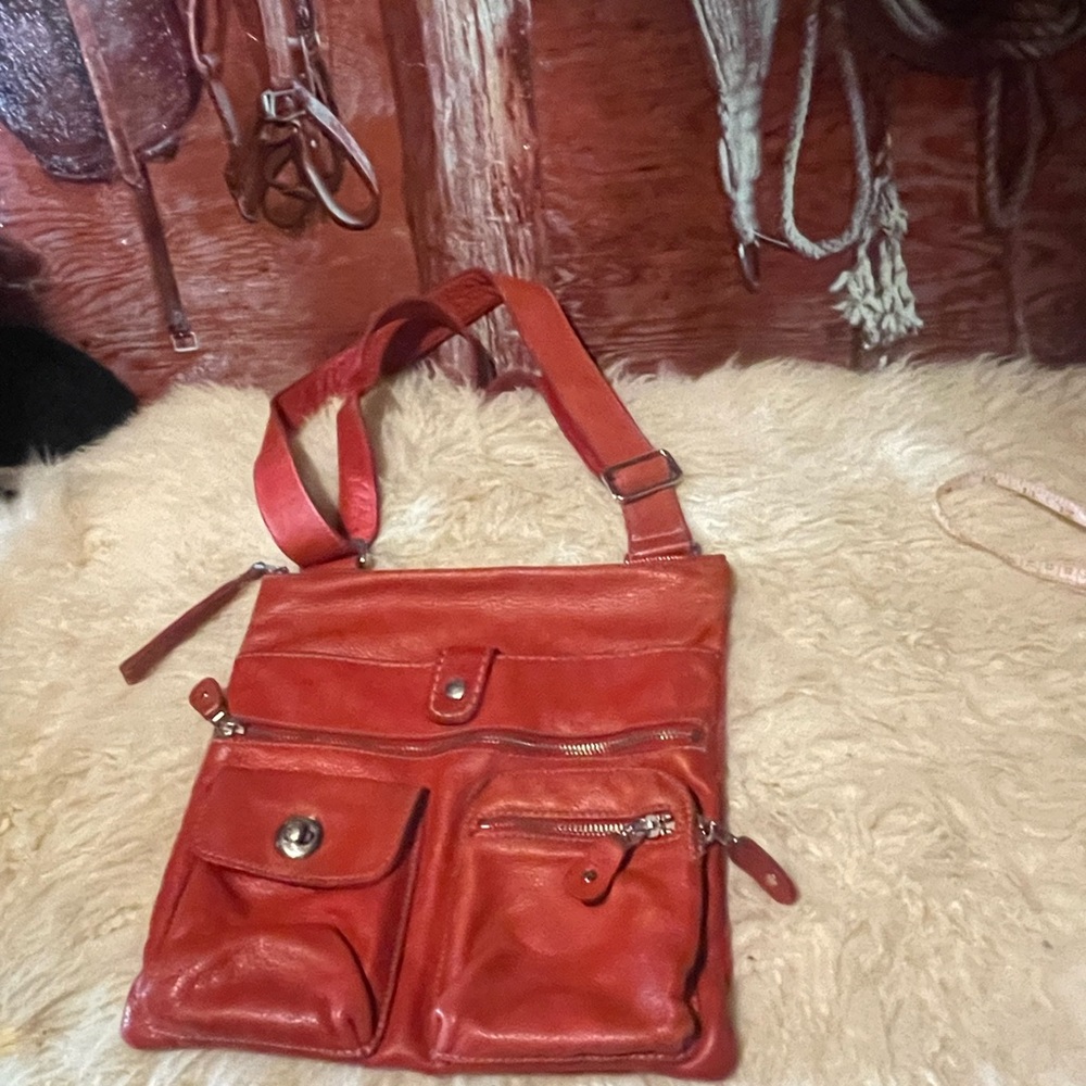 Roots Venetian red leather bag